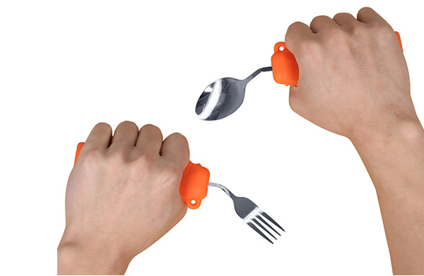 Adaptive utensils with contoured handles and weighted bases