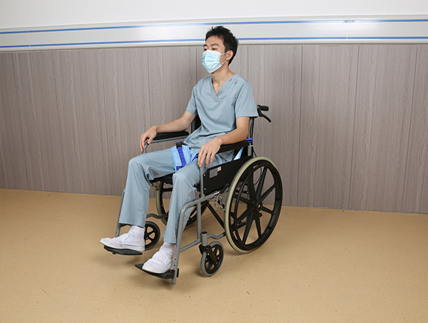 Lateral support pads for wheelchairs